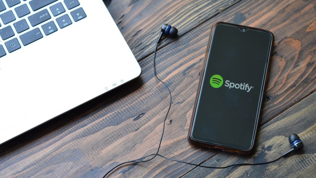 Spotify smartphone laptop