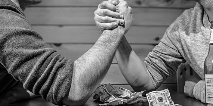 arm-wrestling men power gambling