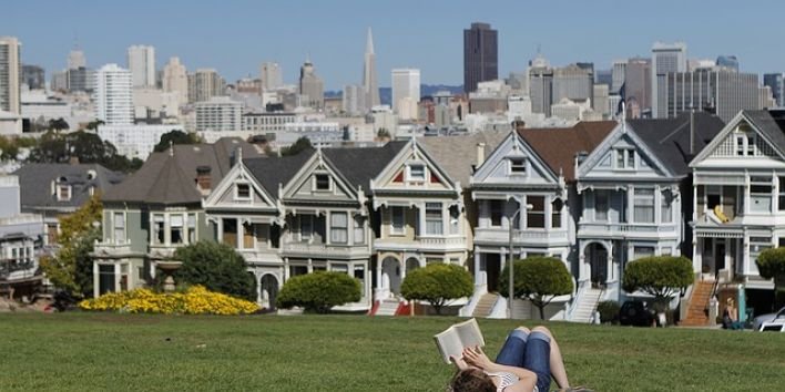 San Francisco woman grass reading book