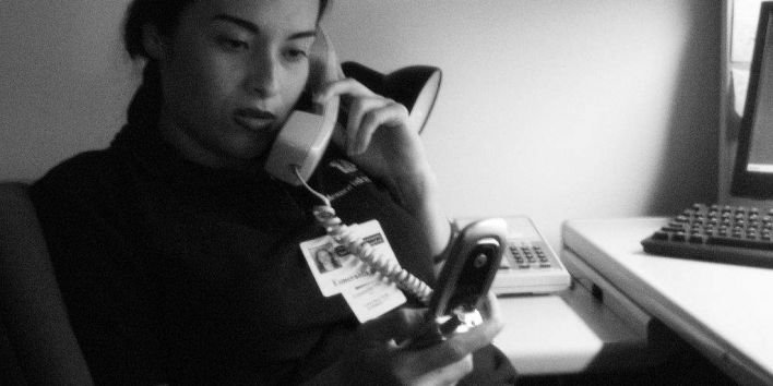 woman multi tasking phone work