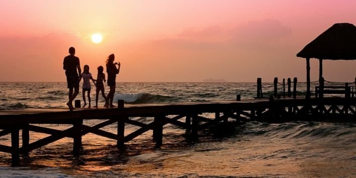 family holiday ocean vacation travel pier sunset