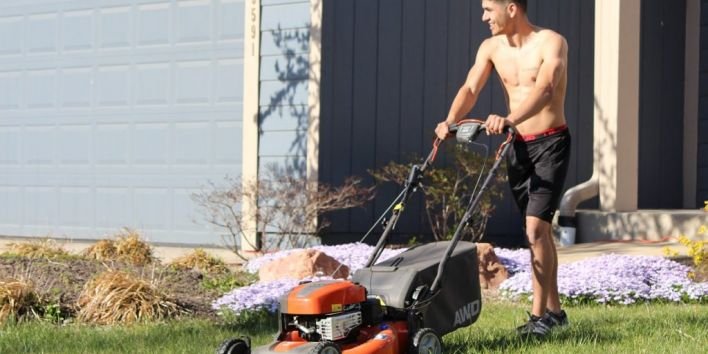 grass mowing garden work man