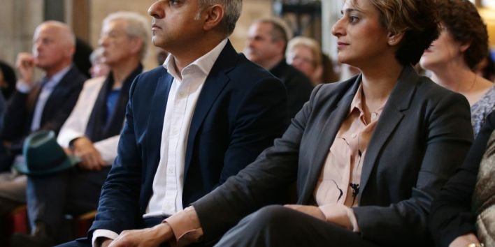 Britain's incoming London Mayor Sadiq Khan (L) sits with his wife Saadiya, during his swearing-in ceremony at Southwark Cathedral in cental London on May 7, 2016. London's new mayor Sadiq Khan thanked voters for choosing "unity over division" as he was elected Saturday, becoming the first Muslim leader of a major Western capital. / AFP PHOTO / POOL / Yui Mok