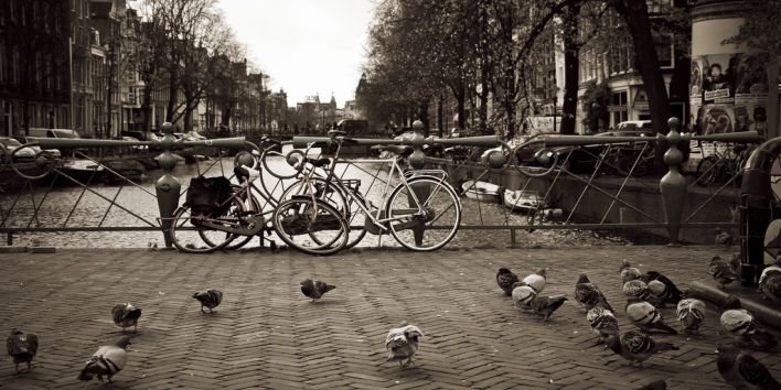amsterdam bikes water canal