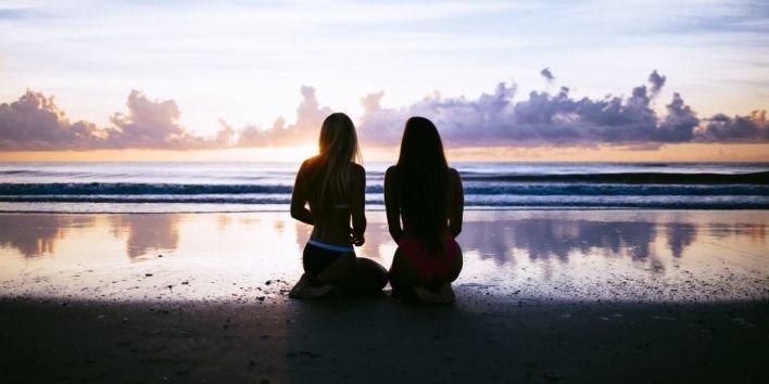 women friends beach sunset