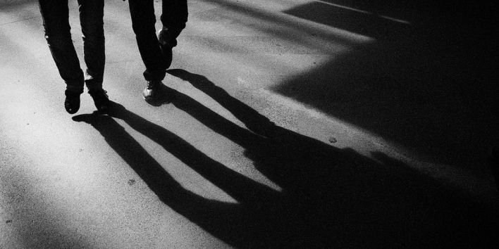 walk legs feet street shadow
